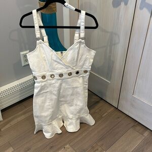 Women’s dress Bebe brand new with tag size 4 white denium.